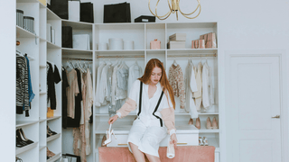 Woman in walk-in closet