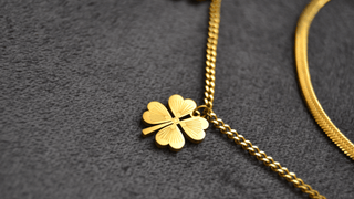 Gold jewelry with charm