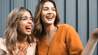 Women laughing together