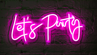 Neon pink "Let's Party" sign
