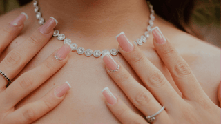Woman wearing pretty silver necklace