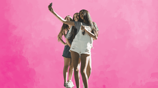 Three young women taking a selfie together