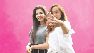 Women taking a selfie