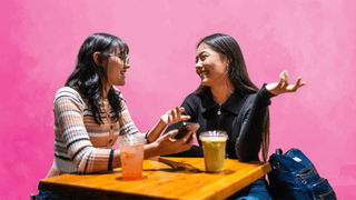 Women sitting at a table talking