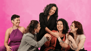 Group of women laughing and smiling
