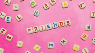 Letter tiles spelling out the word "friends"