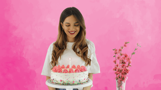 Woman with birthday cake