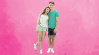 Young couple posing for photo together