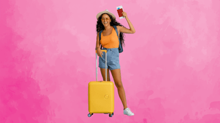 Tourist with suitcase and passport