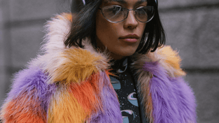 Woman wearing colorful coat
