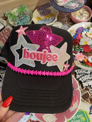 Black trucker hat with fun patches and hat chain